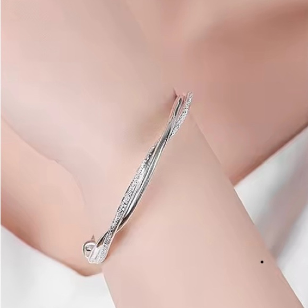 Elegant Silver Twist Bracelet